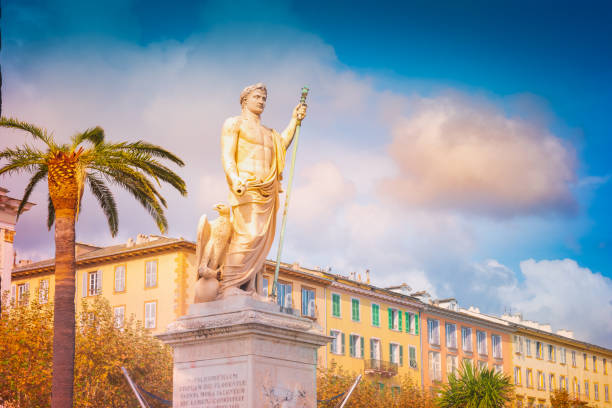 View of the Place Saint-Nicolas square in Bastia, View of the Place Saint-Nicolas square in Bastia, Corsica, France, highlighting the old statue of Napoleon Bonaparte as a roman emperor, sculpted on 1813 haute corse photos stock pictures, royalty-free photos & images