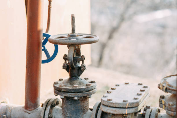 istock Environmental problems and pollution. Gas taps and pipes in nature. 1137474463