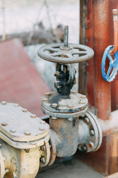istock Environmental problems and pollution. Gas taps and pipes in nature. 1137474513