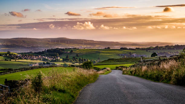 South Pennines on summer Countryside road at South Pennines on summer lancashire photos stock pictures, royalty-free photos & images