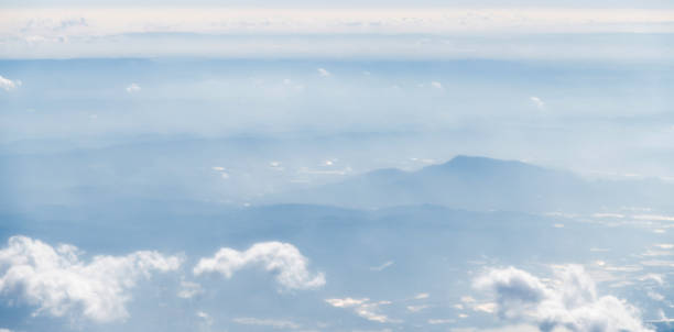 istock Aerial view of mountains in clouds 1137482118