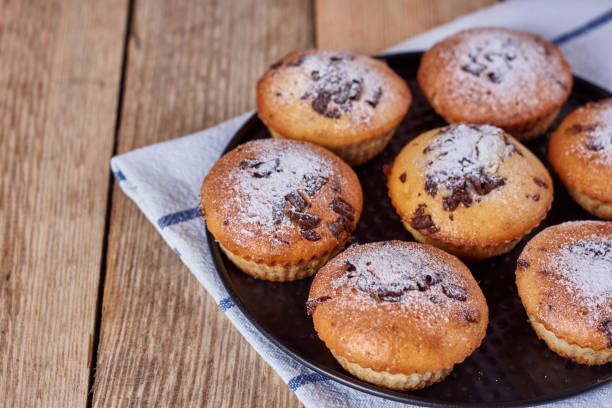 istock Homemade cupcakes with chocolate and powdered sugar 1137482275