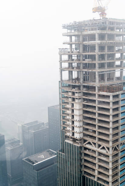 istock Skyscrapers construction site in foggy day 1137483433