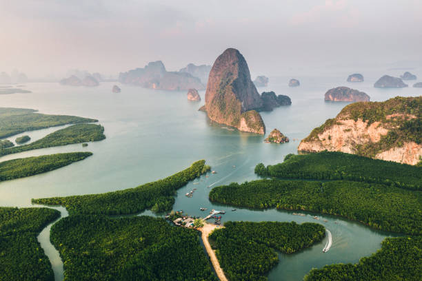 vista aérea cénico de phang nga no nascer do sol - sun fog sky river - fotografias e filmes do acervo