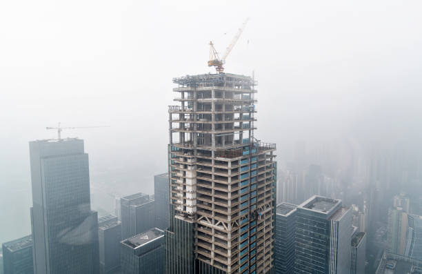 istock Skyscrapers construction site in foggy day 1137485106