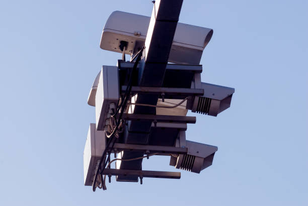 istock Traffic camera above road over city background 1137486316