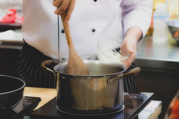 istock Chef preparing food, meal, in the kitchen, chef cooking, Chef decorating dish 1137489329