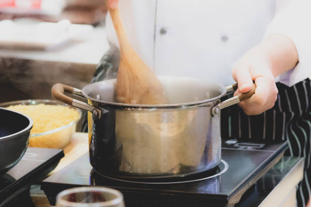 istock Chef preparing food, meal, in the kitchen, chef cooking, Chef decorating dish 1137489343