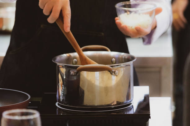 istock Chef preparing food, meal, in the kitchen, chef cooking, Chef decorating dish 1137489348