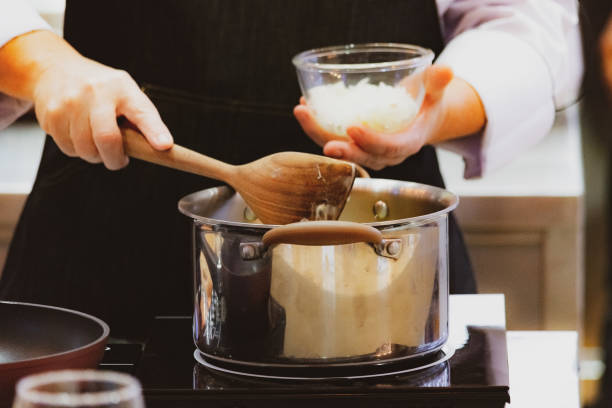 istock Chef preparing food, meal, in the kitchen, chef cooking, Chef decorating dish 1137489352