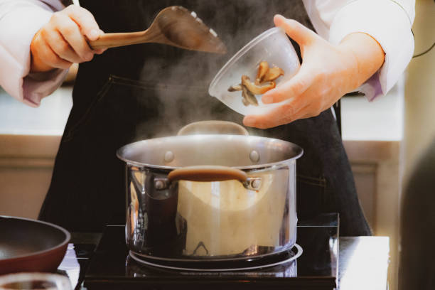 istock Chef preparing food, meal, in the kitchen, chef cooking, Chef decorating dish 1137489361