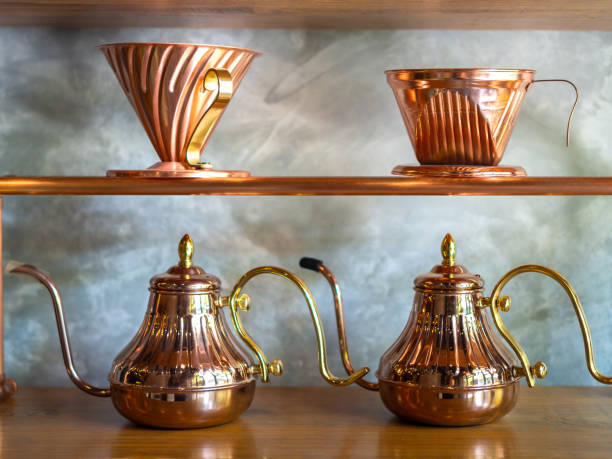 istock Vintage copper hand drip coffee kettle with vintage copper coffee dripper 1137492028