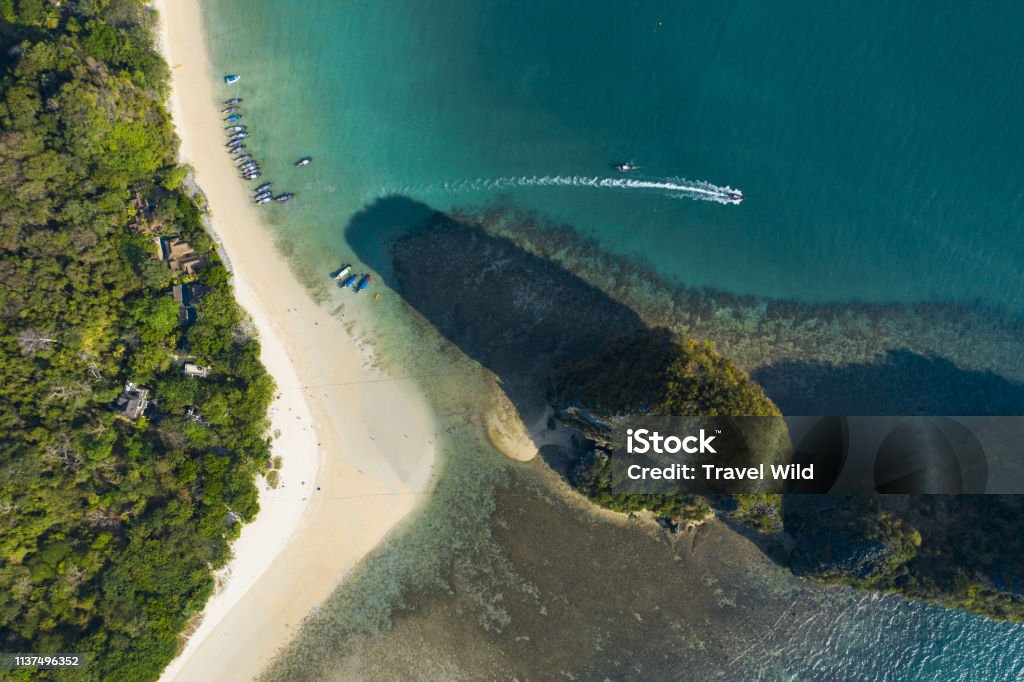 View from above, Stunning aerial view of the beautiful Railay Beach during low tide, Ao Nang, Krabi Province, Thailand. Above Stock Photo