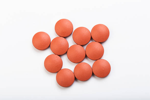 istock set of pink tablets  on a white background - Image 1137498871