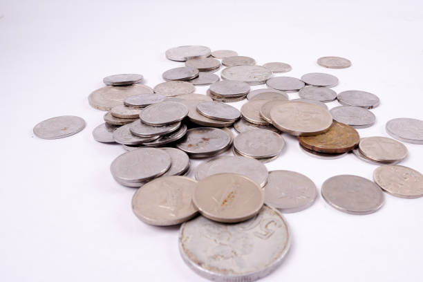 istock High Angle View Of Coins On White Background 1137503717
