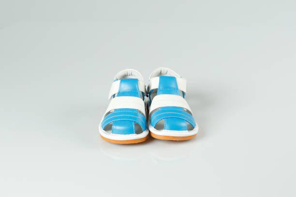 istock White and blue shoes for kid 1137504250