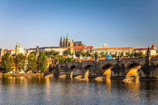istock Prague Castle and Charles bridge above Vltava river. 1137509384