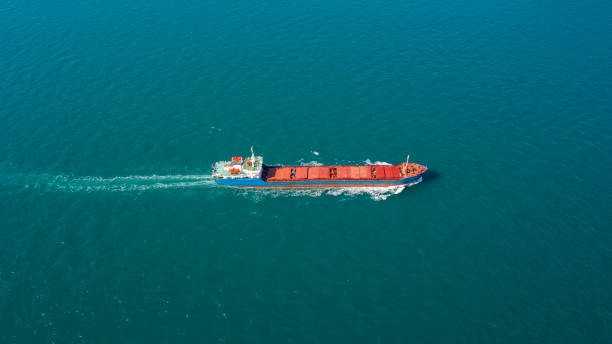 istock Aerial top view container ship full speed and beautiful wave on the sea for logistic 1137512461