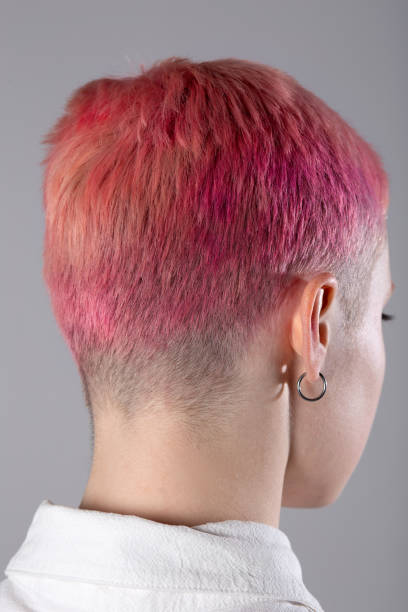 istock Woman with short pink hair 1137514326