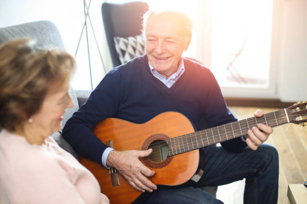 istock Playing a guitar for his wife 1137517242