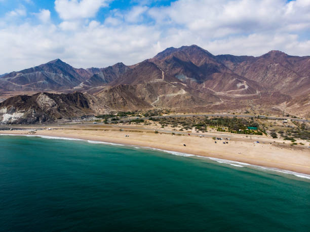 Fujairah sandy beach in the United Arab Emirates Fujairah sandy beach in the United Arab Emirates aerial view fujairah stock pictures, royalty-free photos & images