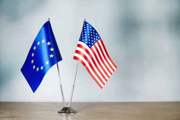 istock European Union and American flag standing on the table 1137521023