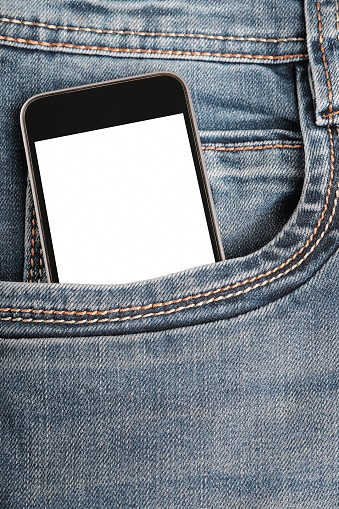 Mock up with modern  smartphone in jeans pocket. Copy space for your banner or text on screen. Vertical orientation