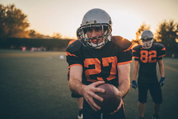 istock American football players on training 1137522451