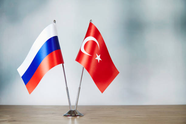 istock Russia and Turkey flag standing on the table 1137524608