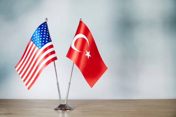 istock American and Turkey flag standing on the table 1137524947