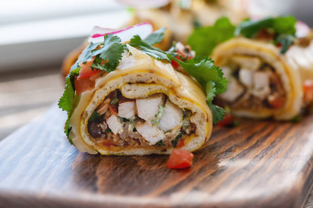 istock Traditional mexican enchiladas with chicken meat and spicy tomato. 1137528518