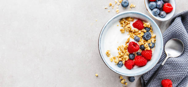 istock Yogurt with berries and granola in bowl 1137528818