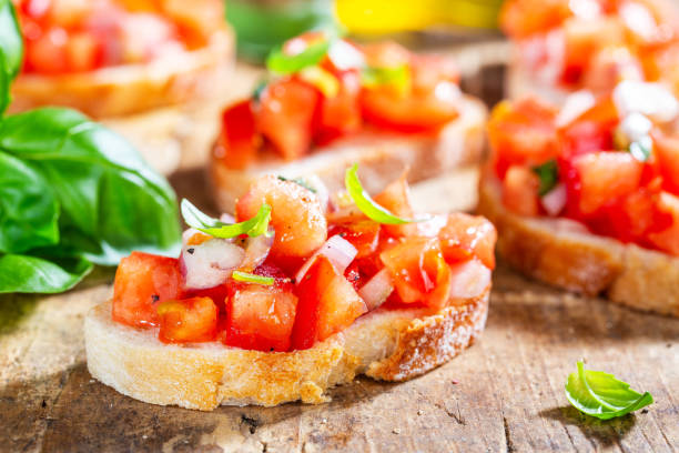 istock Classic italian bruschetta served on wooden board 1137529603