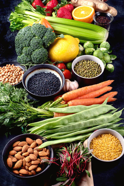 istock Healthy organic food on dark background. 1137529782