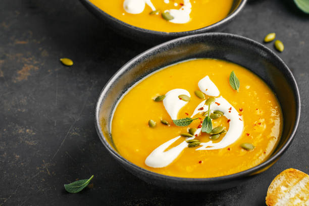 istock Pumpkin creamy soup served in bowls 1137530307