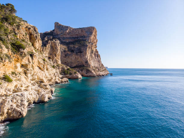 istock Cliffs in Moraig cove beach in Benitatxell, Alicante, Spain 1137537636