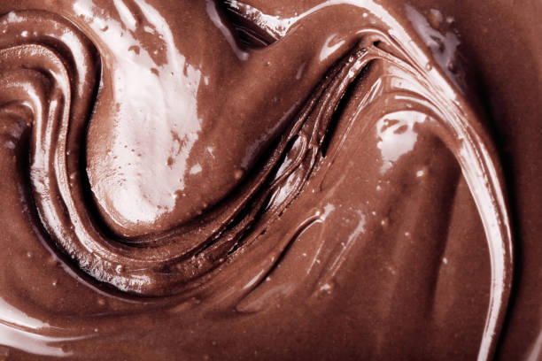 istock Melted chocolate swirl as a background closeup 1137537930