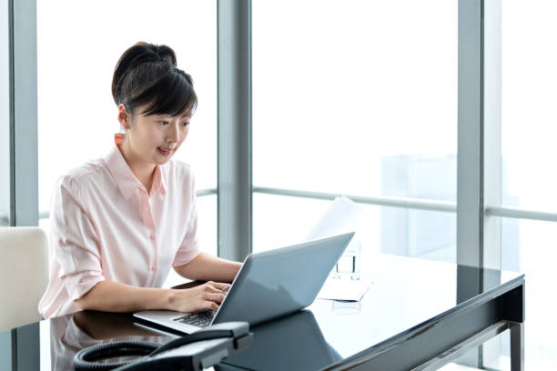 istock Businesswoman using laptop in the office 1137540929