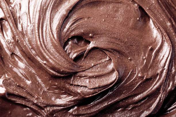 istock Melted chocolate swirl as a background closeup 1137541035