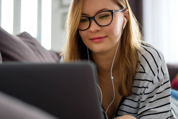 istock Millenial girl at home 1137542346