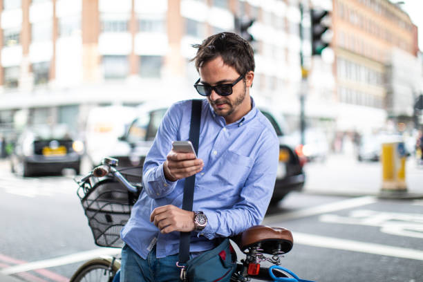 Man searching google maps on phone in London
