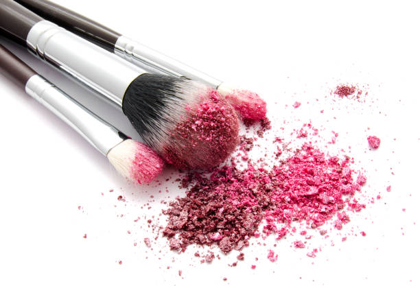 istock Professional makeup brush and colourful eye shadows isolated 1137543412