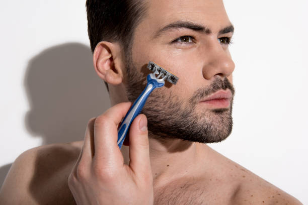 istock Attractive young man is shaving bristle 1137543727