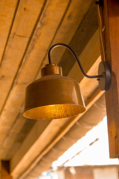 istock Old brass lamp with wooden pole 1137545808