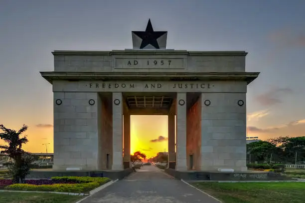 The Independence Arch of Independence Square of Accra, Ghana at sunset. Inscribed with the words "Freedom and Justice, AD 1957", commemorates the independence of Ghana, a first for Sub Saharan Africa.