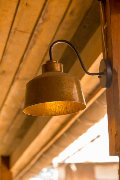 istock Old brass lamp with wooden pole 1137548223