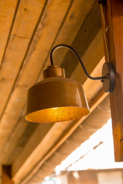 istock Old brass lamp with wooden pole 1137548226