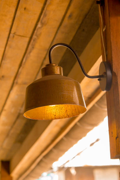 istock Old brass lamp with wooden pole 1137548227