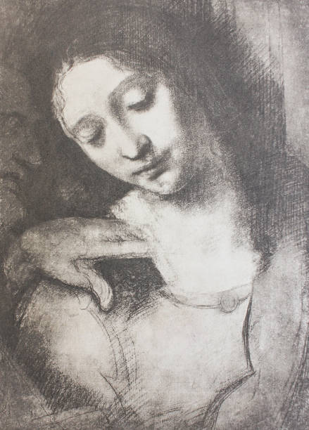 istock Head of the apostle Saint John by Leonardo Da Vinci in a vintage book 1137548850