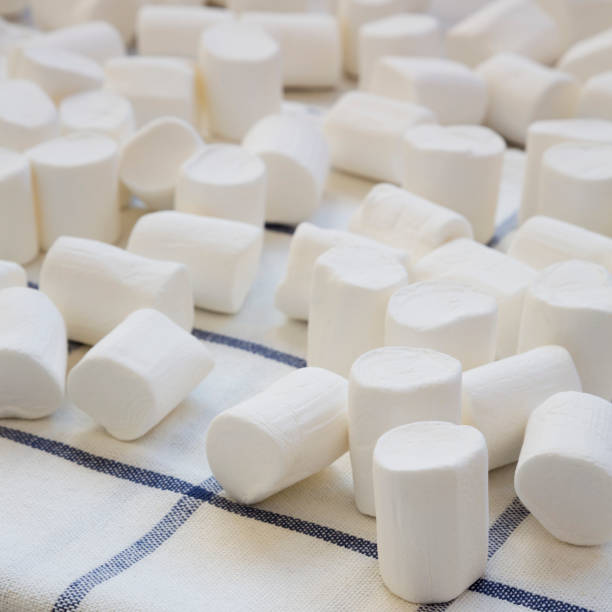 istock A lot of white marshmallows on cloth, side view. Closeup. 1137550553